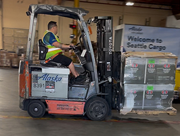Alaska Air Cargo forklift and warehouse