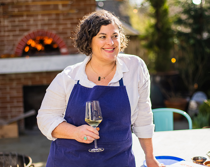 Chef Renee Erickson with wine glass