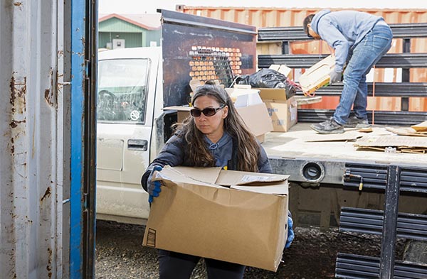 Anahma Shannon carrying a box